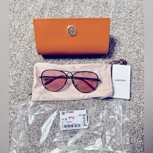 Brand new authentic Tory Burch sunglasses.        style#0TY6093